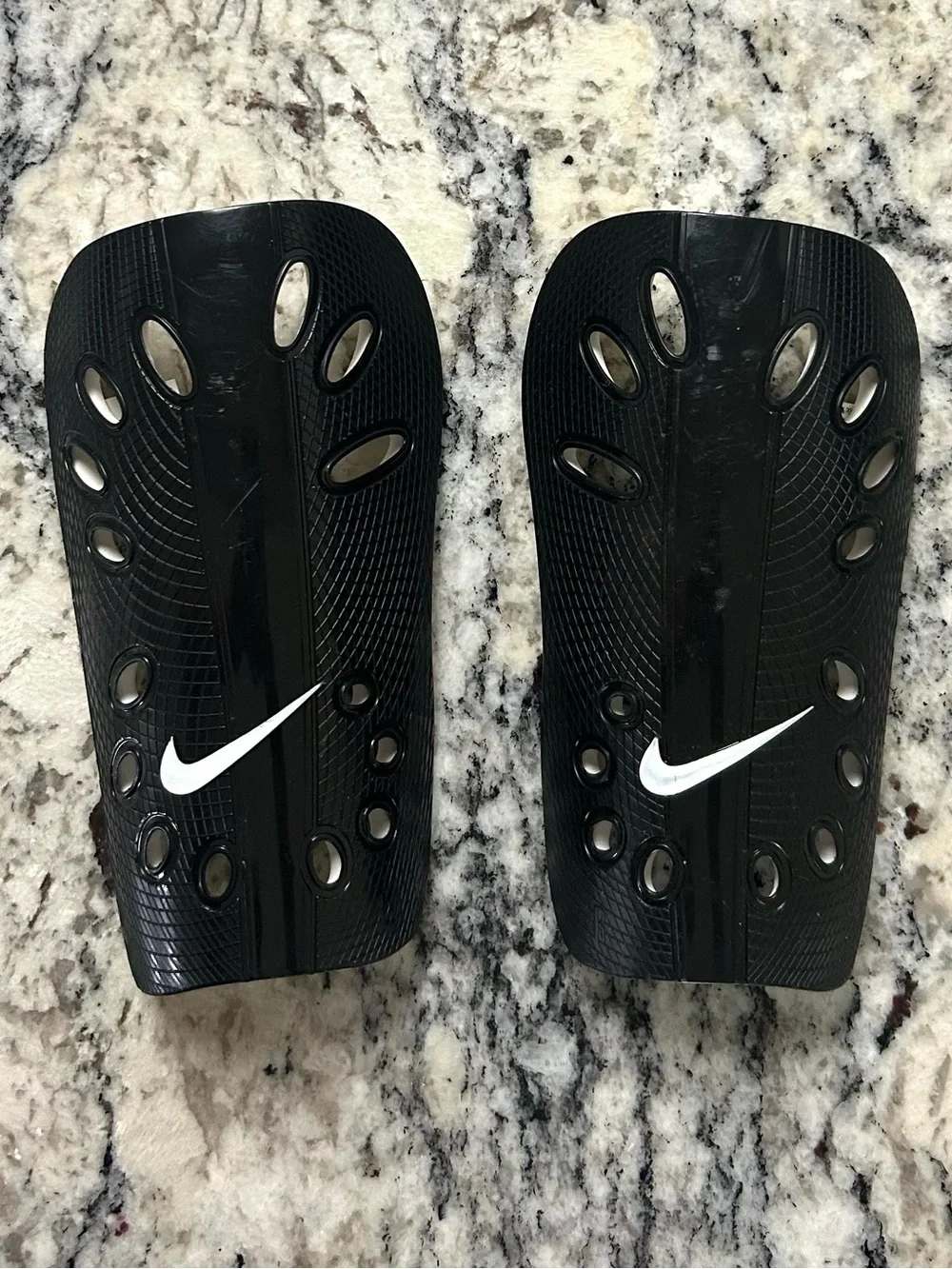 Youth Nike Black Shin Guards with White Tag